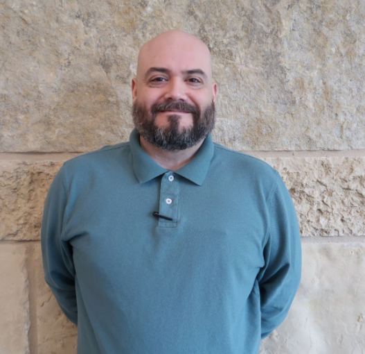 A photo of peer support specialist George Barrera who offers mental health support at Buda Public Library